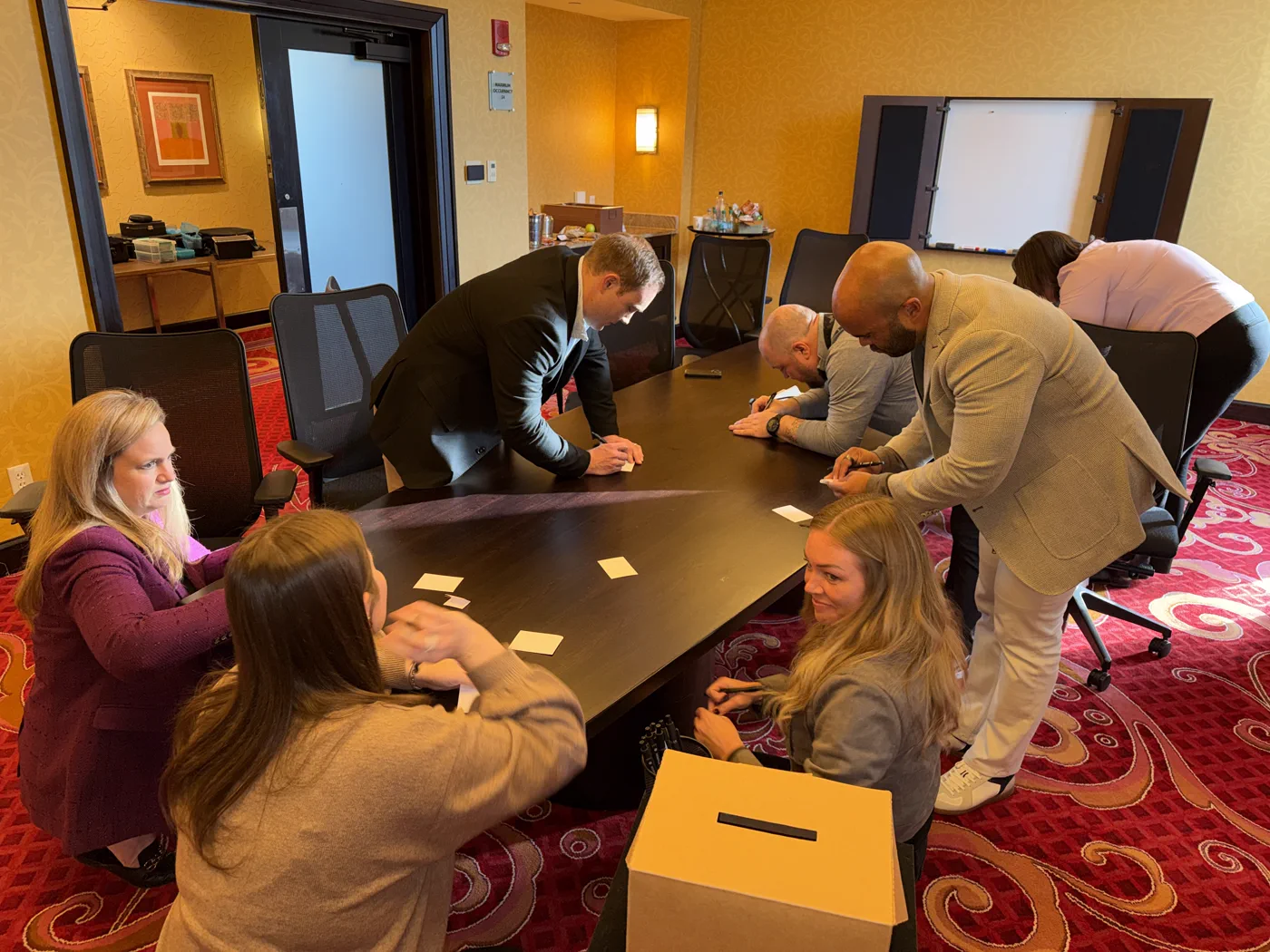 The Versus RX team working together during the team building exercise