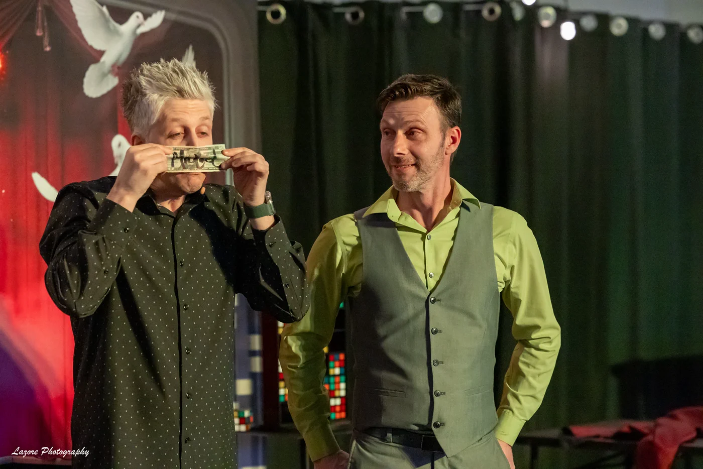 Wade Live performing comedy magic with a guest at a private event